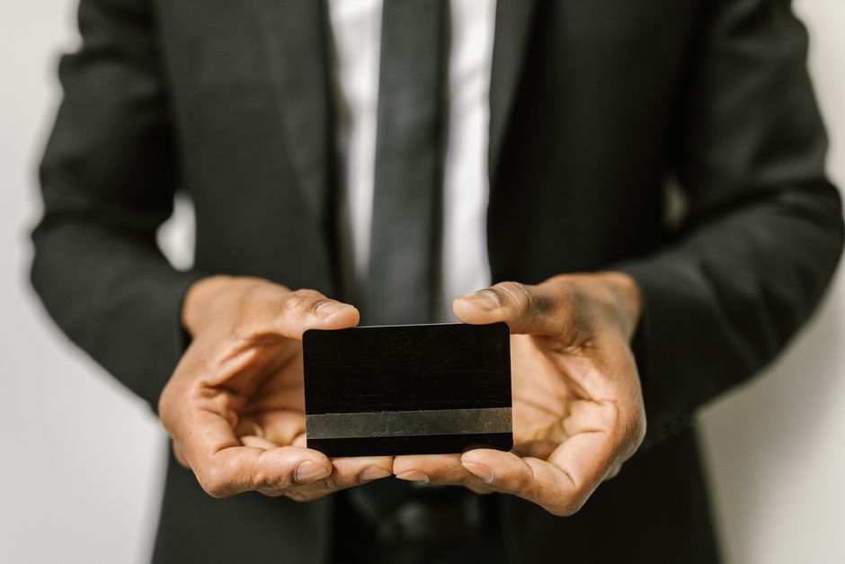 Entrepreneur accessing business line of credit on tablet with financial growth charts