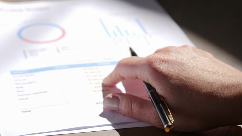 Business dashboard showing working capital metrics and cash flow graphs on modern display